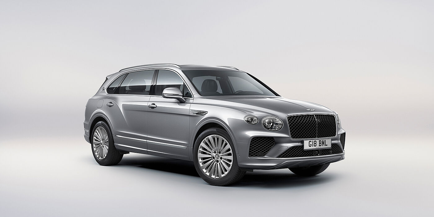 Bentley St Peter Bentley Bentayga Extended Wheelbase luxury SUV front three quarter view in Moonbeam paint with 21 inch five spoke painted wheels