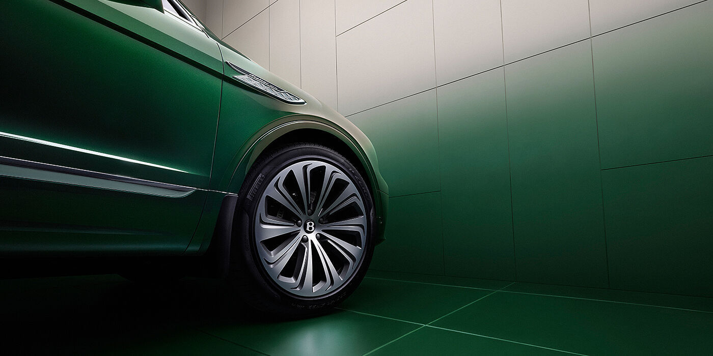 Bentley St Peter Bentley Bentayga Atelier Edition SUV in Light Emerald green paint front side detail with 22 inch 10 spoke wheel
