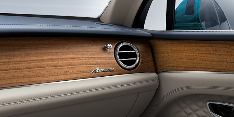Bentley St Peter Bentley Bentayga Extended Wheelbase Azure front dash showing Open Pore Koa veneer surrounded by Portland and Imperial Blue hides